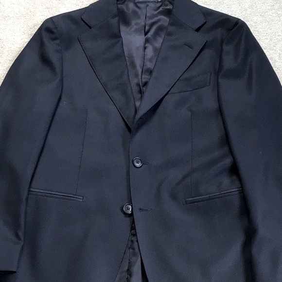 Classic tailored 100% cotton suit.